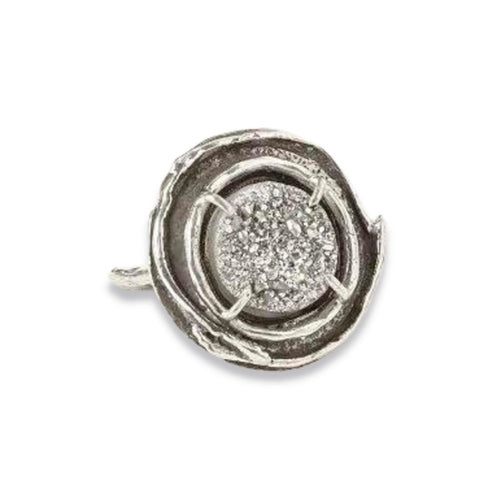 Stare steadily into the eye of this fascinating sterling silver ring, and you will see why it is so hard to turn away. Enchanting druzy stones are ensconced within in a swirl of branch-like silver. This unique handcrafted Boho style ring is made to be adjustable. Details Head: 1