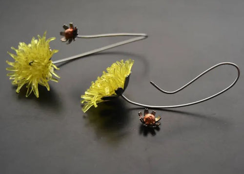 Earrings are made from recycled PET bottles and stainless steel. Stainless steel parts are cut by laser own artwork. The length of earrings is 8 cm. The closure is a screw The wire is 1.2 mm thick at the thread, the remaining part is 1 mm thick.  Handmade item Materials: stainless steel, PET bottles