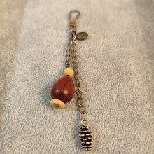 Load image into Gallery viewer, Wood and Pinecone Essential Oil Keychain
