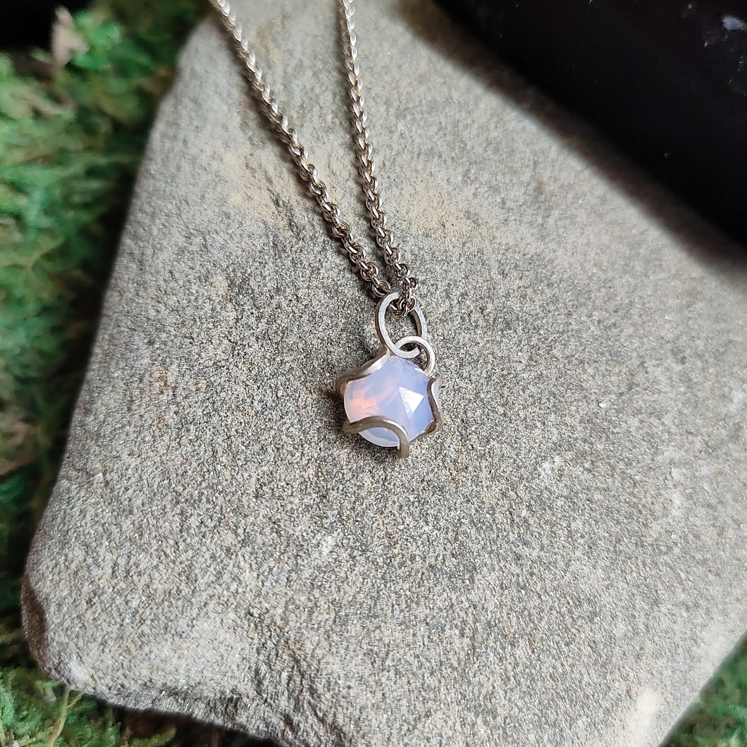 Lavender Quartz, luminous and opalescent, this pale purple gemstone goes with pretty much every skin tone. Set in my signature open iris setting,