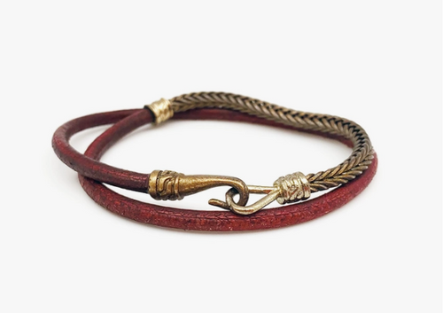 Aadi Burgundy Cord Snake Chain Hook Closure Bracelet. Made with materials such as genuine leather, jute, wood, and iron.  Aadi Men's Collection is handcrafted by artisans in India.