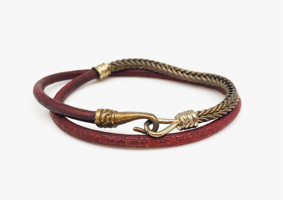 Aadi Burgundy Cord Snake Chain Hook Closure Bracelet. Made with materials such as genuine leather, jute, wood, and iron.  Aadi Men's Collection is handcrafted by artisans in India.
