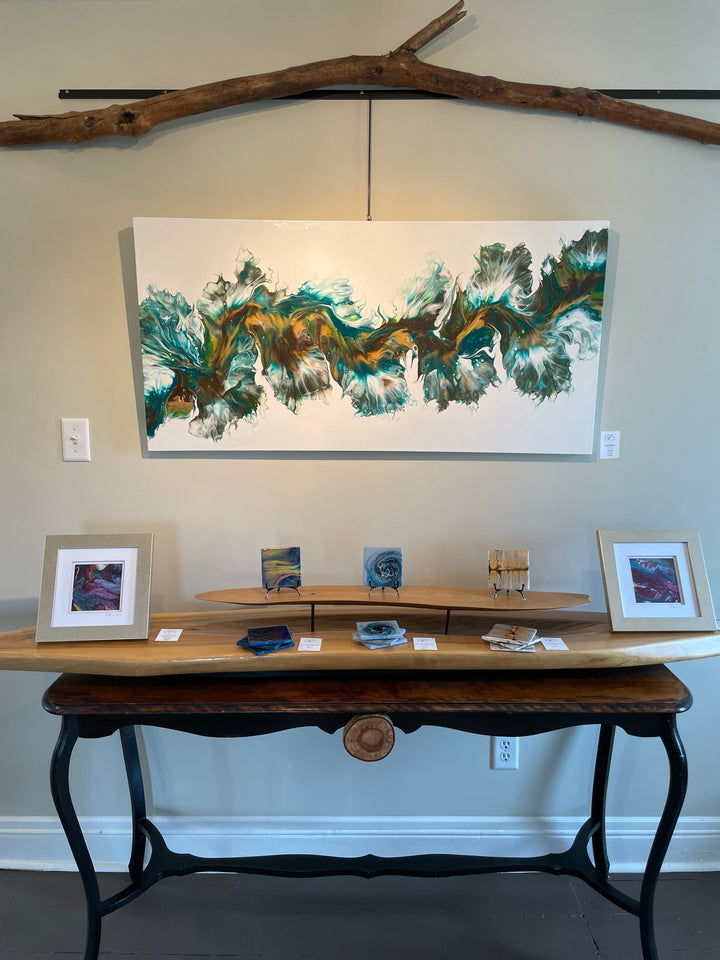 Rotating Art Gallery featuring month long solo exhibits by local artists. Featured: Shy Fox Studio acrylic pour art