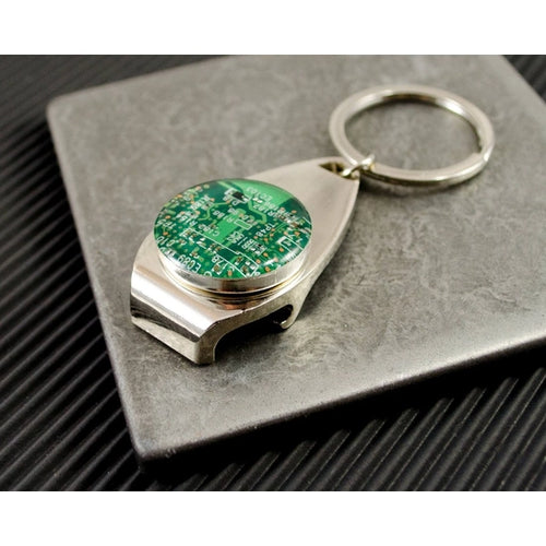 Key tag bottle opener keychain features a recycled circuit board disc that is set under resin, which provides a beautiful and protective finish.  This keychain is 1 inch (25 mm) across and comes with a key ring.  Made in United States