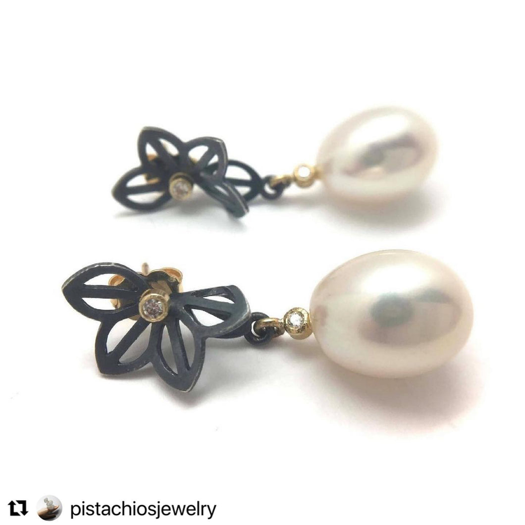 These earrings have our Petite Anise Fold origami shapes at the top and golden pearl dangles below.  They have .10 ct total weight of Harmony recycled G-I color, SI clarity diamonds, and are approximately 1/2” wide x 1” long.