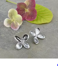 Load image into Gallery viewer, A hydrangea flower is cast in sterling silver to create these dainty, any-occasion earrings.  When you think of a hydrangea bloom, you probably envision a number of small flowers forming one gorgeous cloud. And yet, when you look at one little flower by itself, you can see just how delicate and detailed it is. When I cast this hydrangea flower, I was so pleased to see how all of the veining translated to the silver.
