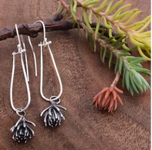 Load image into Gallery viewer, I think of sedums as Nature’s adornment; the variety of foliage shapes and textures makes them seem like living art. They are some of my favorite succulents because they are vibrant and geometrically shaped.     I cast these sedums in sterling silver and hung them from hinged loops. The hinges give these earrings great movement. They are comfortable and fun to wear. Choose either the longer (2 1/2 inches) or shorter (2 inches) version.   
