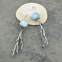 Load image into Gallery viewer, These earrings embody the calm drift of ocean current. The blue and white swirl of the larimar stones reminds me of a sea foam swell. Beneath the surface, fronds of seaweed gently undulate.  These earrings pair beautifully with the larimar and seaweed necklace. recycled sterling silver
