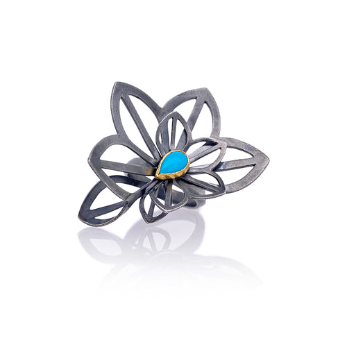One-of-a-kind Double anise fold ring with turquoise, sterling silver and 22k gold. 1 3/4″ x 1 1/4″.