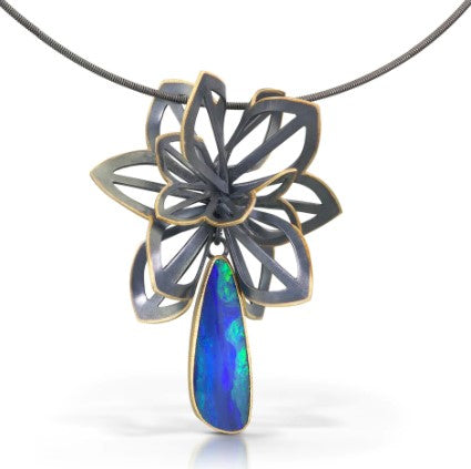 This one of a kind necklace features an oxidized Origami cluster pendant made of recycled sterling silver completely edged in recycled 18K yellow gold. Hanging from the cluster is a stunning 10x28mm Australian opal doublet set in 22k gold on sterling silver.   The pendant is approximately 1.75