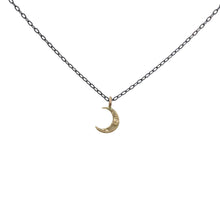 Load image into Gallery viewer, Perfect little crescent moon charm necklace, great for layering or wearing on it’s own. Solid 14k yellow gold moon, on an oxidized sterling silver chain  Handmade clasp &amp; catch. Charm moves freely on chain. chain: 17.5” length. charm: 1/4” long  Handmade in Colorado with carefully sourced materials.
