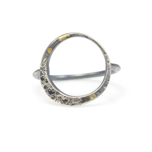 Load image into Gallery viewer, A lyrical moon with three black diamonds and 18k details wraps perfectly around the finger to keep the moon close to you every day. Textured with tiny craters and details.  • 18k yellow gold details • Three black diamonds  Moon is 5/8” Ring is just over 1/2” at tallest point.  This ring is made to order, please allow 2-3 weeks for it to be built to your exact size.  Made in Colorado with carefully sourced materials, including recycled silver and reclaimed black diamonds.
