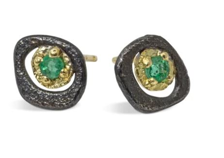 Inspired by nature, these grass green emerald studs are the perfect pair to wear everyday!  Metals: Oxidized sterling silver and 18k yellow gold Stones: Emerald  (0.15ct) Dimensions: 7mm x 8mm