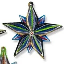 Elegantly decorate your tree this holiday season with this set of 3 Painted Star Ornaments. Handcrafted at the Village Artistique de Noailles in Croix-des-Bouquets, Haiti by Haitian metal artist Jimmy Dade. Steel metal art coated with a gloss varnish and painted  Dimensions: 4